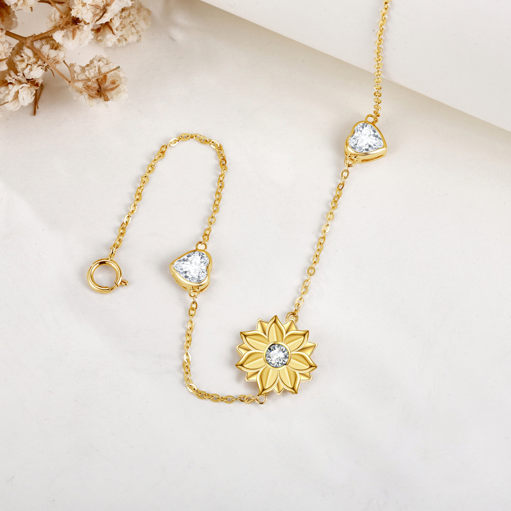 Pulsera con dije de corazón de girasol y circonita cúbica en oro de 14 quilates-4