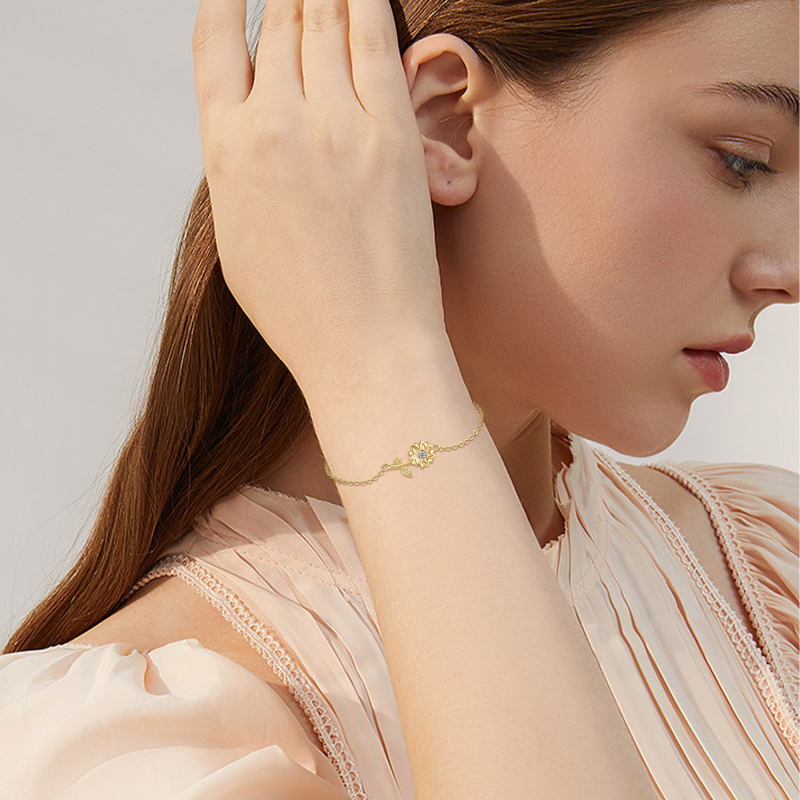 Pulseira com pendente girassol em ouro 14K e zircónias cúbicas-2