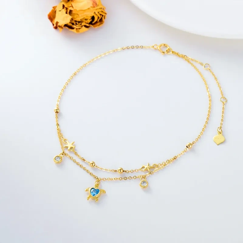 Tobillera con dije multicapa de estrella de mar y tortuga marina en oro de 14 quilates con circonita-4