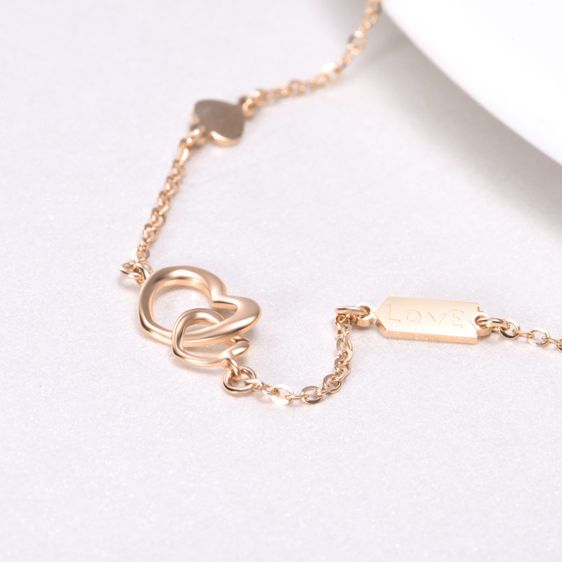 10K Rose Gold Interlocking Hearts Charm Bracelet With Engraved Word For Women-4