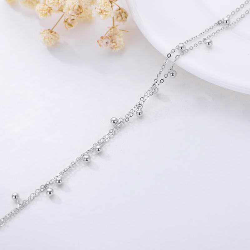 Tobillera multicapa con cuentas de oro blanco de 10 quilates-4