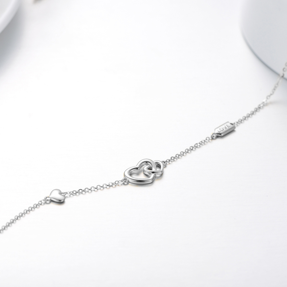 Ineinandergreifendes Herz-Anhänger-Armband aus 10-karätigem Weißgold mit eingraviertem Wort für Damen-4