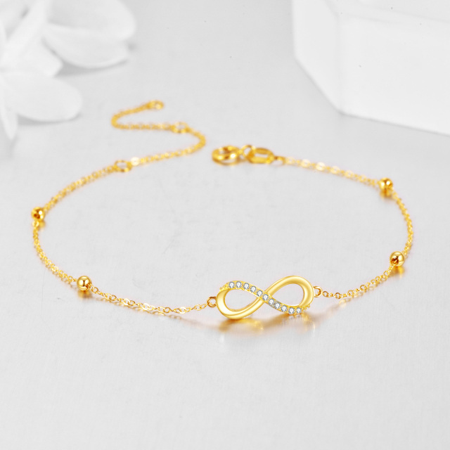 Pulseira com pingente de símbolo do infinito em zircônia cúbica circular de ouro amarelo 14K-4