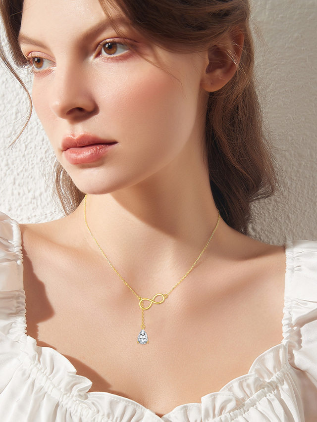 Collier Y réglable en or jaune 14 carats avec symbole de l'infini en forme de poire et zircone cubique-2