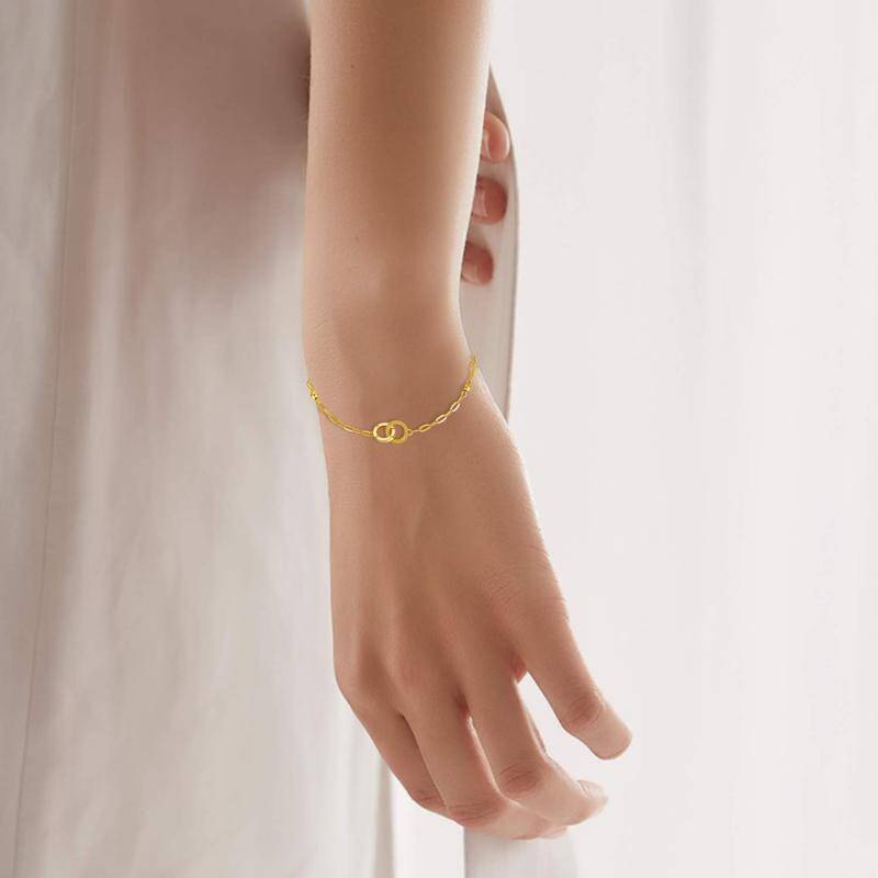 Bransoletka z zawieszką w kształcie koła ze złota 10K-2