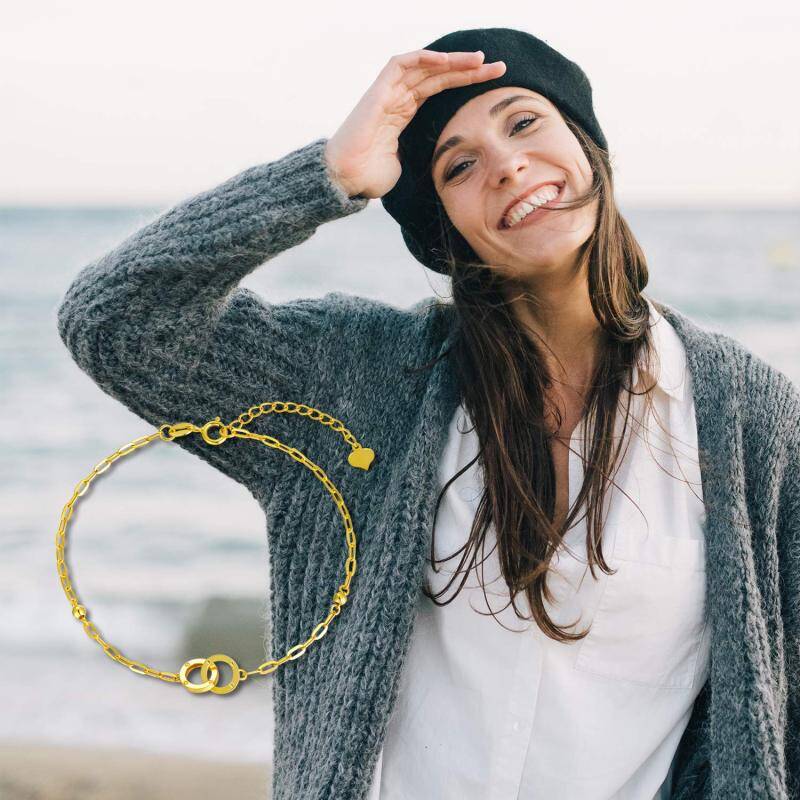 Bransoletka z zawieszką w kształcie koła ze złota 10K-3