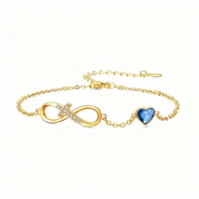 Armband met 18 karaat gouden kristal en moissaniet, kruis, hart en oneindigheidssymbool-1