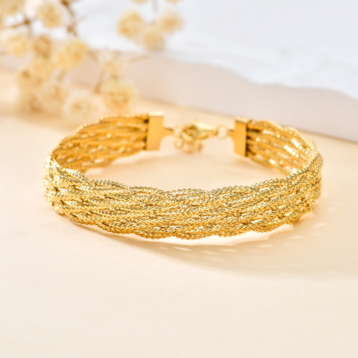 Pulsera entrelazada en capas de oro de 18 quilates-3