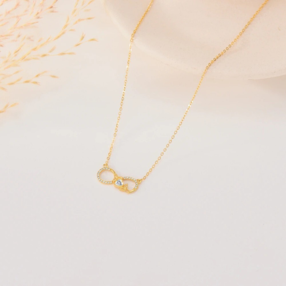Collar con colgante de símbolo de infinito y nudo celta de moissanita en oro de 10 quilates-4