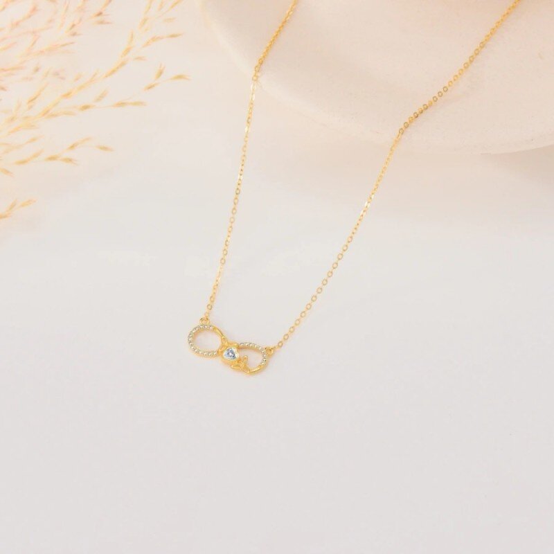 Collana con ciondolo in oro bianco 10K con nodo celtico e simbolo dell'infinito in moissanite-4