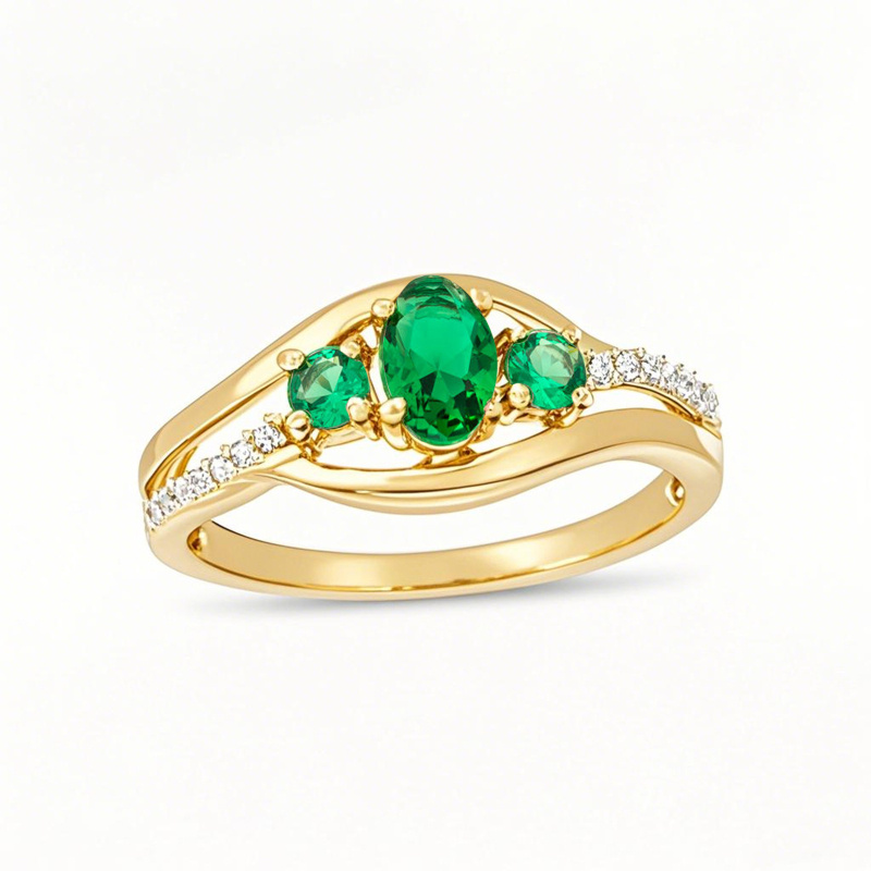 Obrączka zaręczynowa z 10-karatowego złota z owalnym szlifem, laboratoryjnie wykonanym szmaragdem i naturalnym diamentem o masie 0,05 ct, z trzema kamieniami typu bypass-1