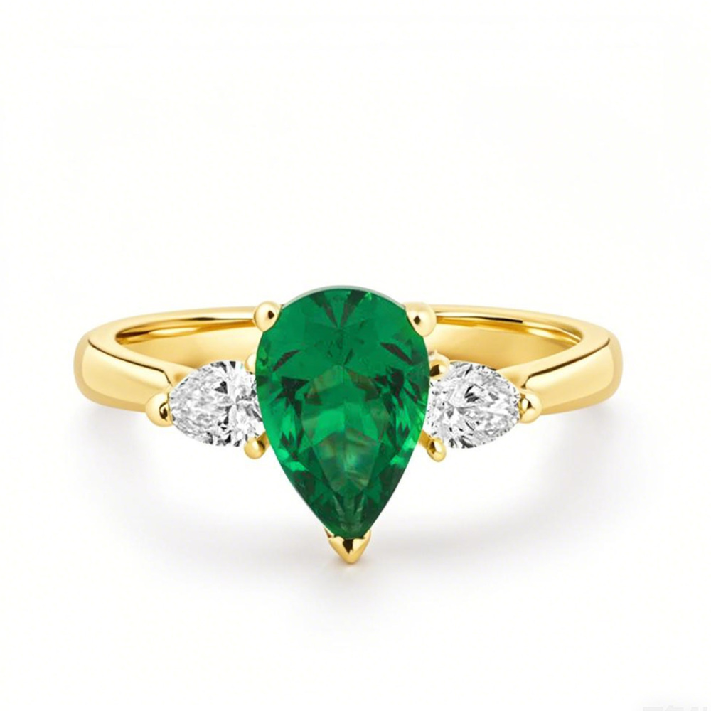 Verlobungsring aus 18 Karat Gold mit Smaragd im Birnenschliff und 0,4 Karat Diamant-1