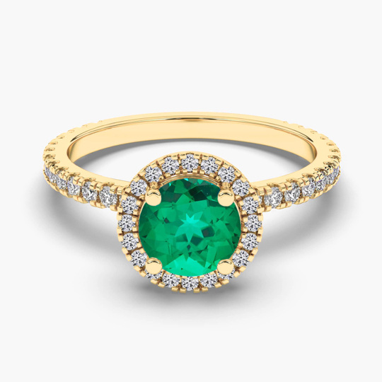 Anillo de compromiso de oro de 10 quilates con halo de diamantes y esmeralda de talla redonda