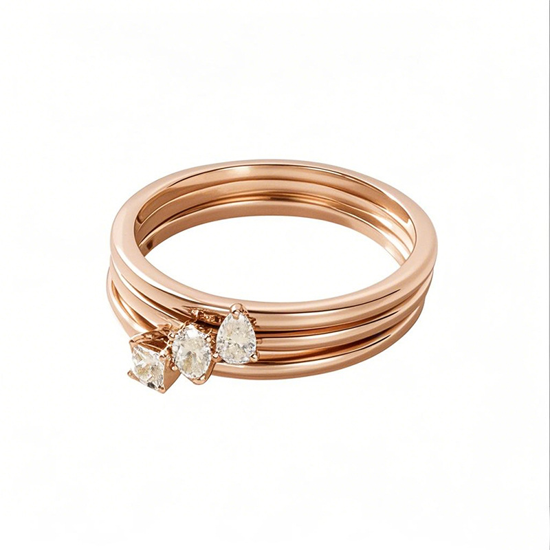 خاتم زفاف من الذهب الوردي عيار ١٠ قيراط، وزن ٠٫٦ قيراط، مرصع بألماس بيضاوي على شكل كمثرى أميرية، مصنوع في المختبر، عيار ٣EX-20