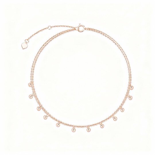 Tornozeleira com pendente multicamadas em ouro rosa 10K