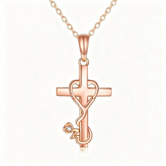 Collier pendentif croix et cœur en or rose 9 carats avec zircon cubique et stéthoscope