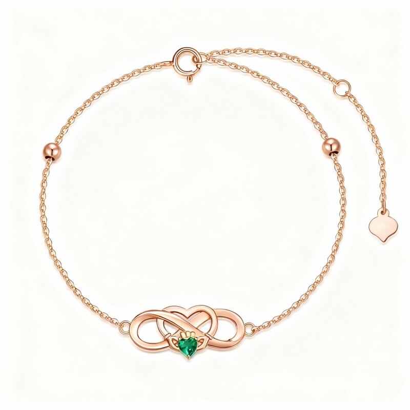 Personalisiertes Armband aus 10-karätigem Roségold mit Kristallanhängern: Geburtsstein, Krone, Herz und Unendlichkeitssymbol-1