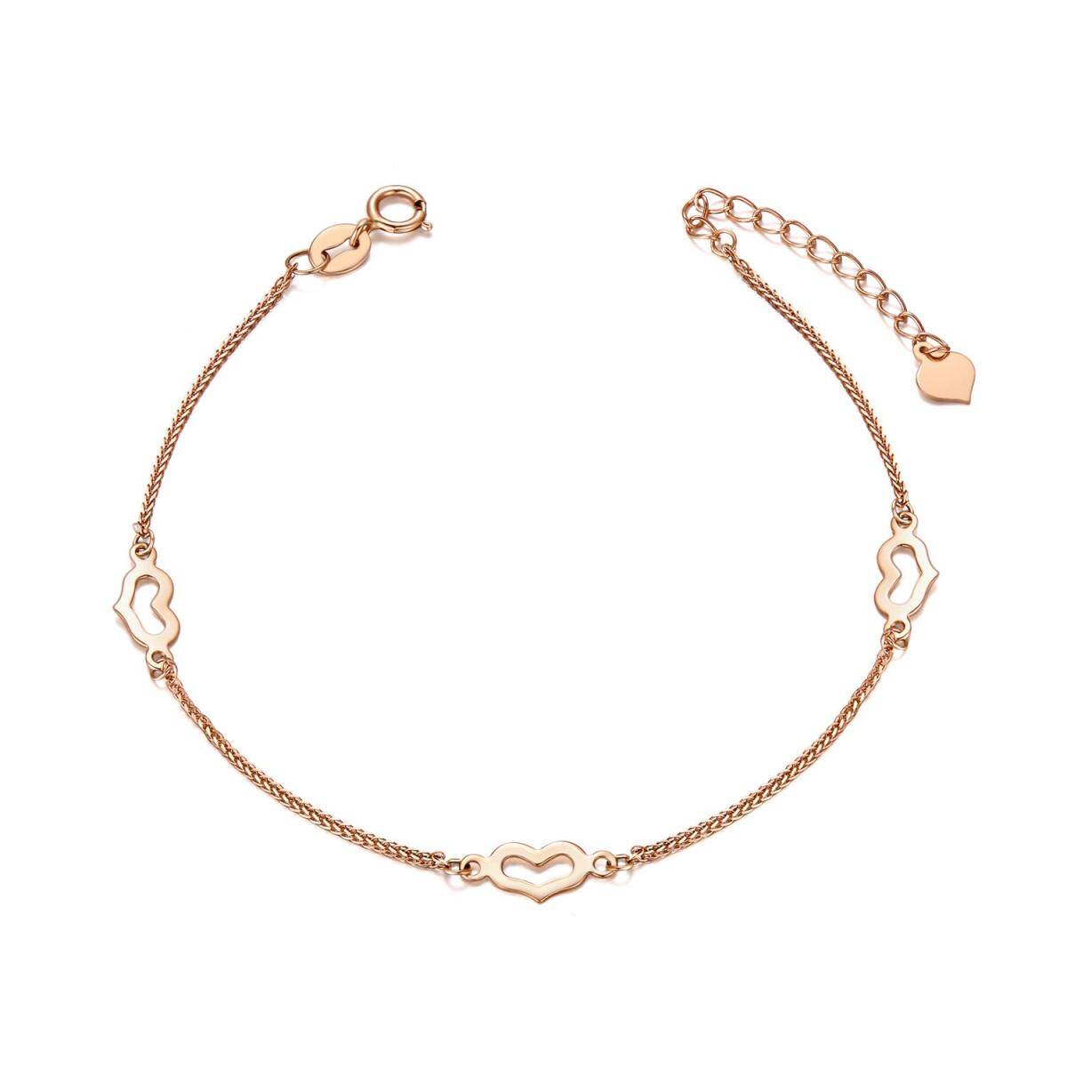 Bracelet en or rose 18K avec pendentif en forme de coeur-1