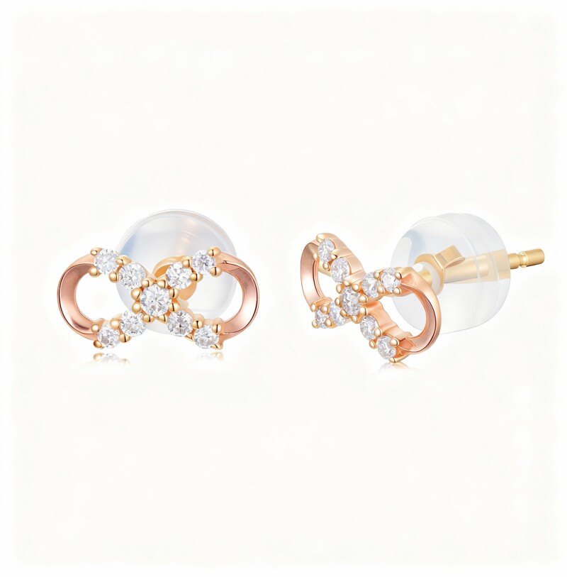 Boucles d'oreilles à clous en or rose 10 carats et moissanite avec nœud-1
