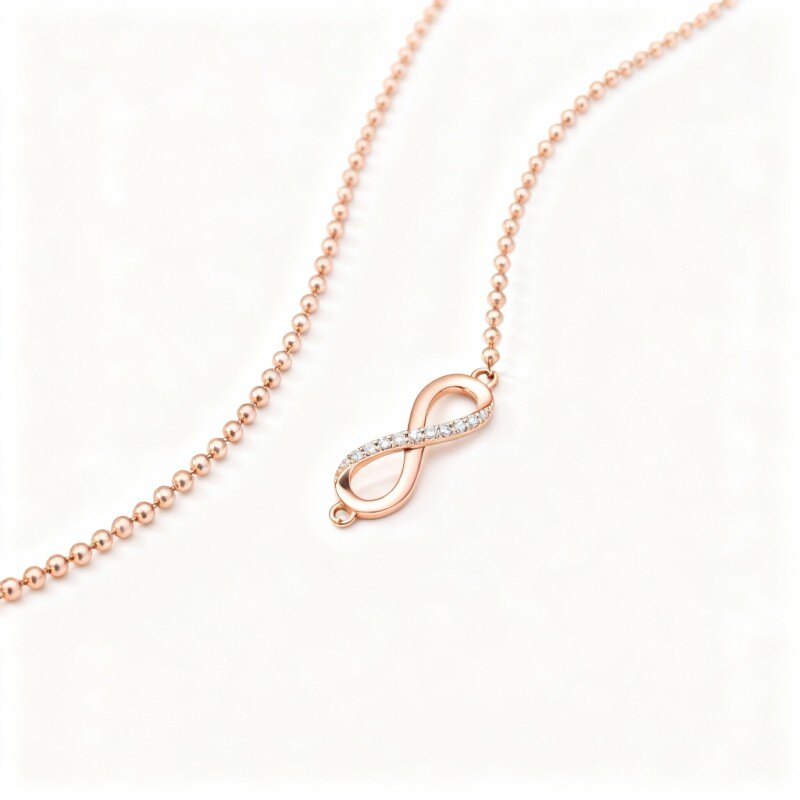 Pulsera con dije de símbolo de infinito de moissanita en oro rosa de 14 quilates-1