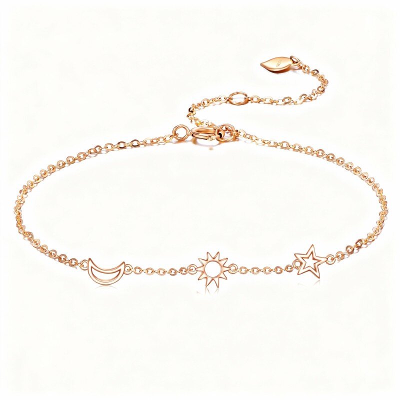 Pulsera con dije de luna y estrella en oro rosa de 18 quilates-1