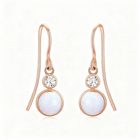Kolczyki z okrągłym opalem z różowego złota 10K