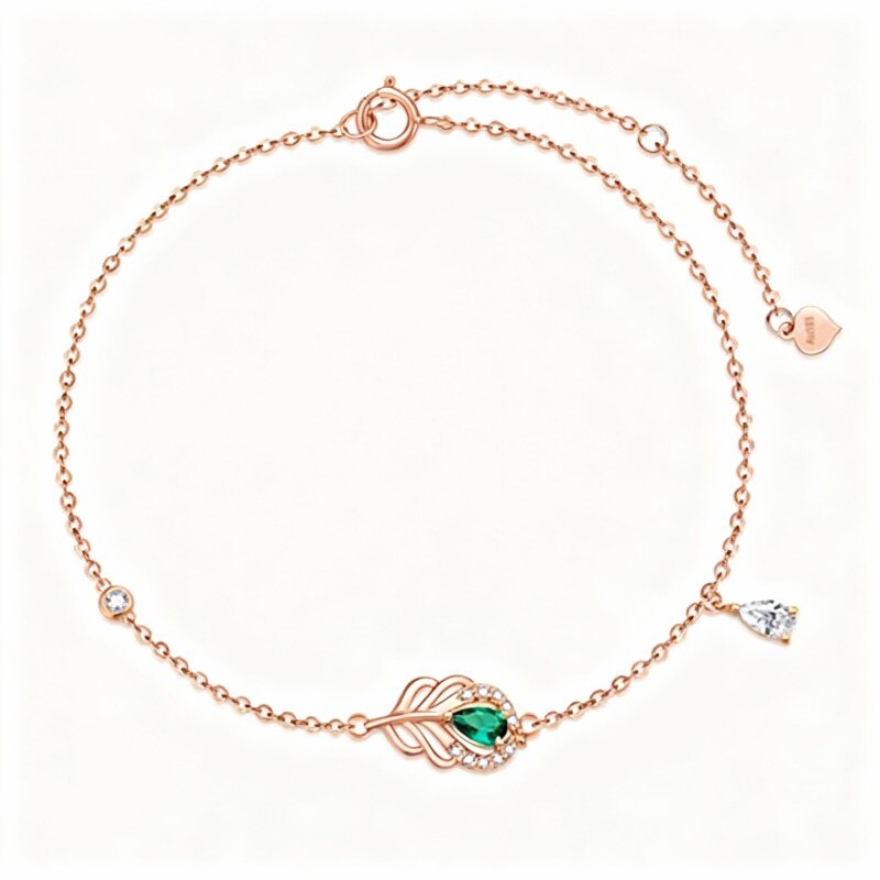 Pulsera con dije de pavo real y pluma en oro rosa de 14 quilates con circonitas cúbicas-1