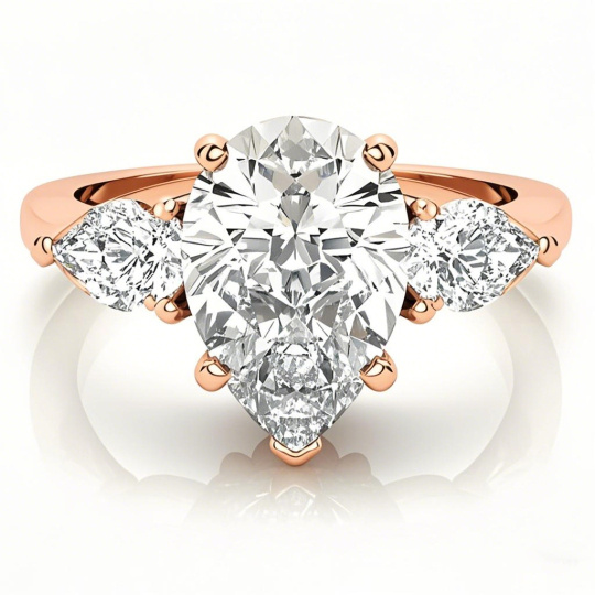 10K Rose Gold Pear Cut Three-Stone Moissanite Engagement Ring