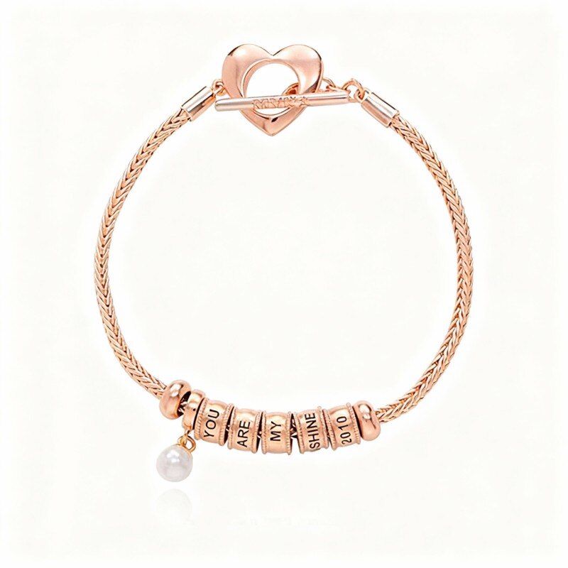 Pulsera con dije grabado personalizado de perla en oro rosa de 10 quilates-1