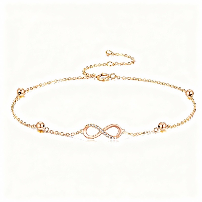 Bracelet à breloques en or rose 10 carats avec zircon cubique rond et symbole de l'infini-1