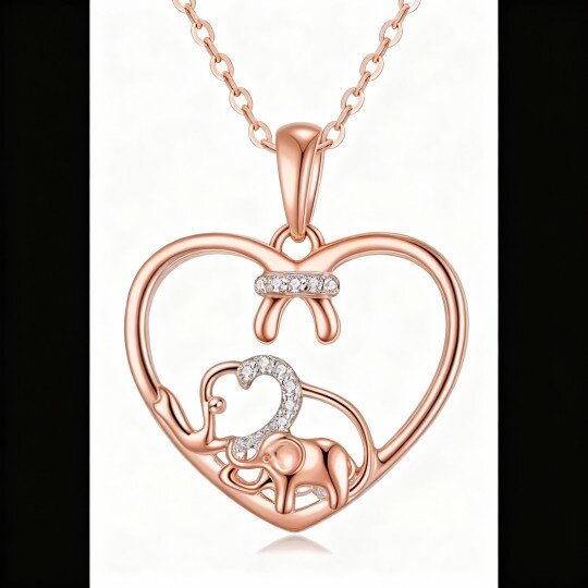 Collier pendentif éléphant et cœur en or rose 10 carats et moissanite taille ronde