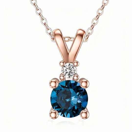 Collar con colgante redondo de oro rosa de 10 quilates con moissanita y topacio de talla redonda
