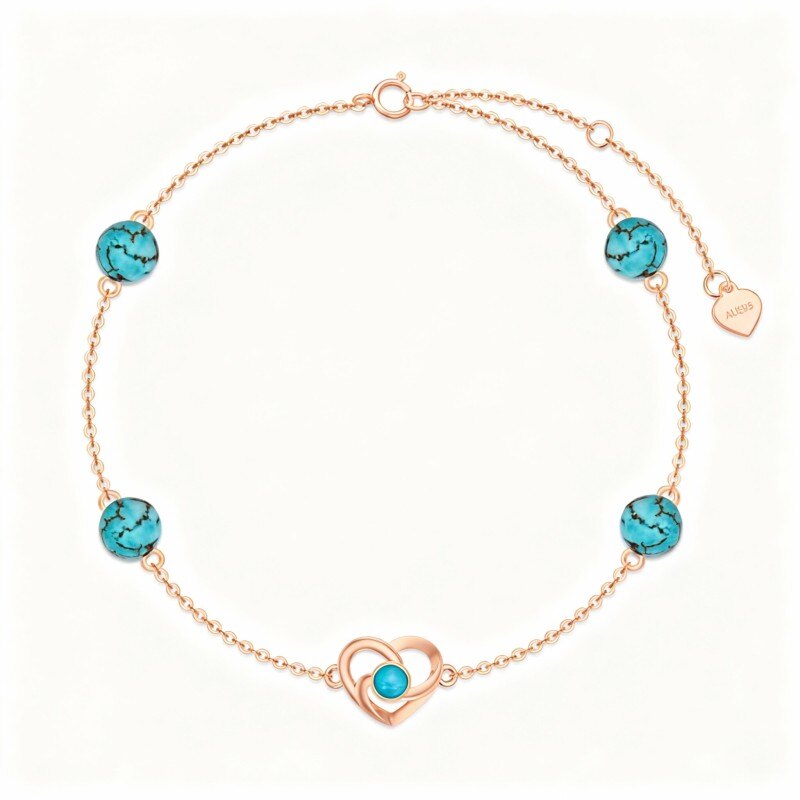 Bracelet en or rose 10 carats avec breloque cœur, motif nœud celtique et turquoise.-1