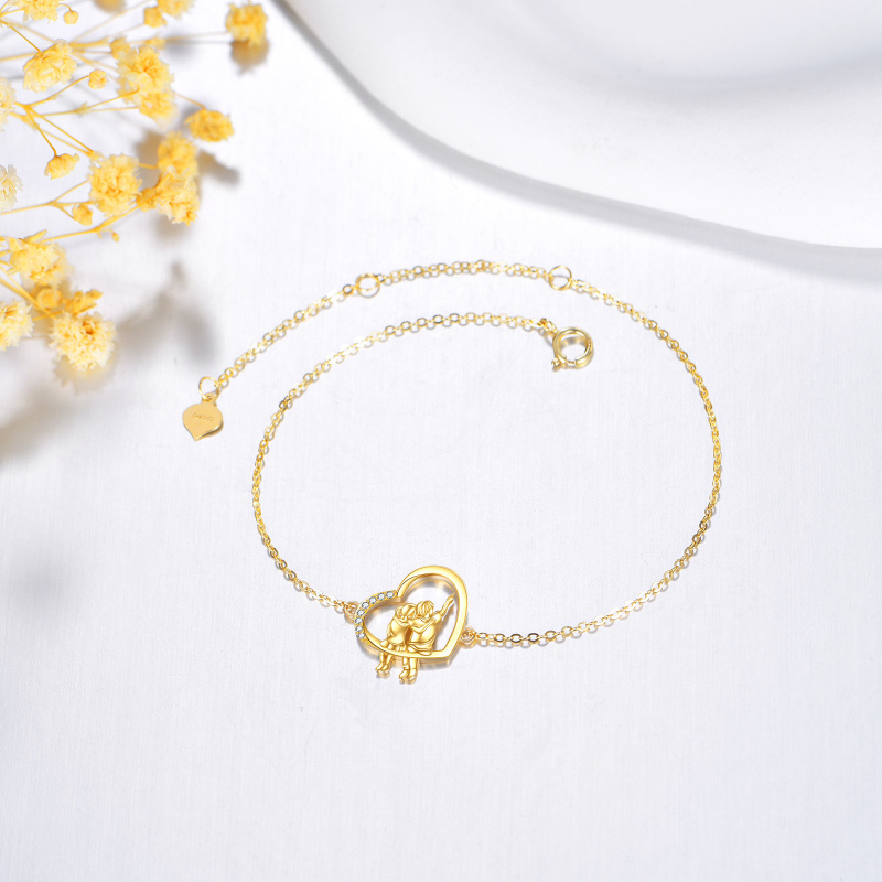 Bracelet à breloques en or 18K avec zircone cubique représentant un frère et une sœur ainsi qu'un cœur-3