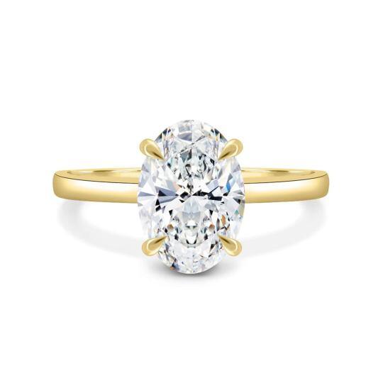Anillo de compromiso de moissanita con corte ovalado en oro de 10 quilates