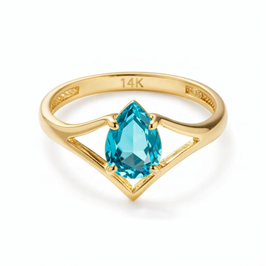 Anillo de compromiso de oro de 14 quilates con topacio cortado en forma de pera