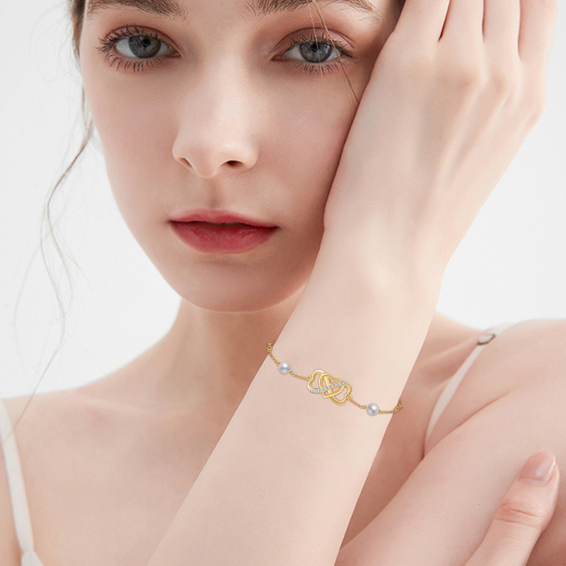 Pulsera con símbolo de infinito y corazón de perla en oro de 14 quilates para mujer-2