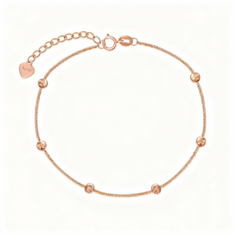 Bracelet à maillons et perles en or rose 10 carats-1