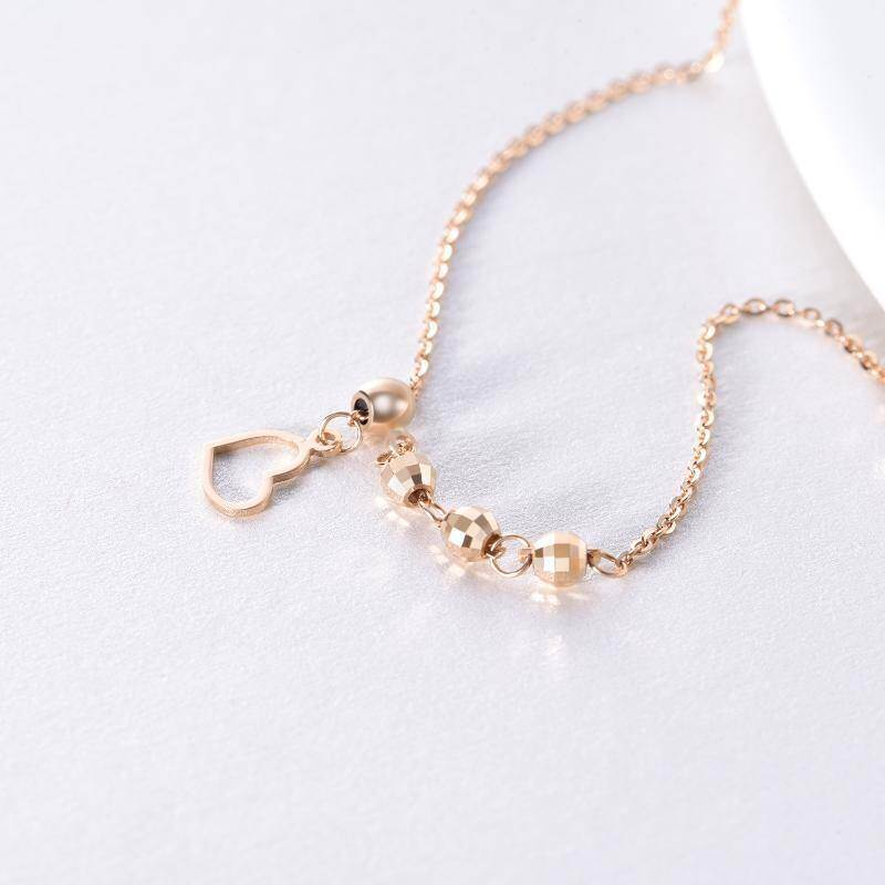 Tobillera de oro rosa de 18 quilates con dije de corazón y cuentas de una sola capa-3