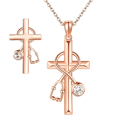 Ketting met kruis- en stethoscoophanger van 10 karaats roségoud en gegraveerd woord.