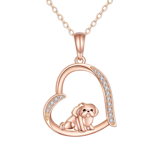 Halsketting met hanger in de vorm van een hondje en hartje, bezet met 10 karaats roségoud en kubische zirkonia.