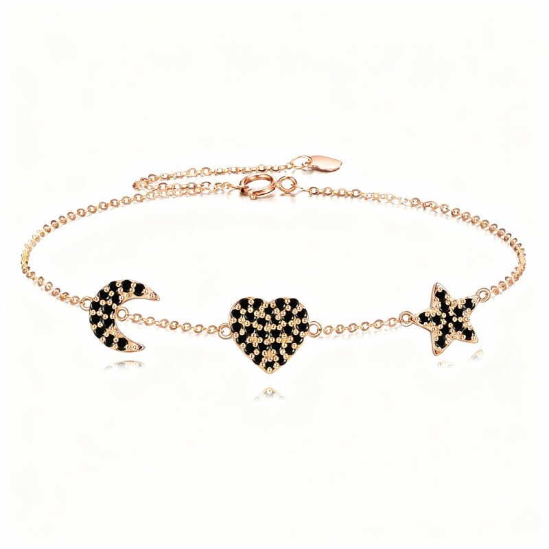 Pulsera de oro rosa de 14 quilates con dije de corazón, luna y estrella con circonitas cúbicas.-1