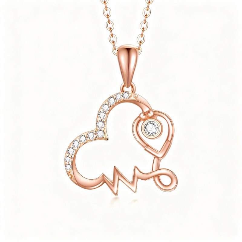Collar con colgante de corazón y estetoscopio de circonita cúbica en oro rosa de 18 quilates-1
