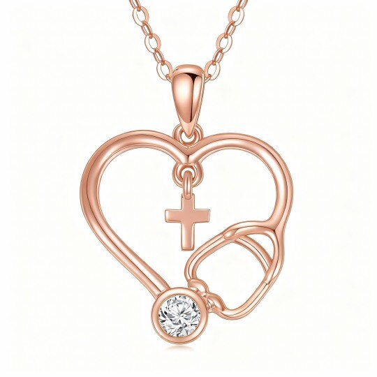 Personalisierte Halskette aus 10-karätigem Roségold mit Zirkonia-Geburtsstein, Kreuz, Herz und Stethoskop-Anhänger