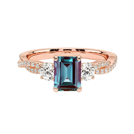 Anillo de compromiso de oro rosa de 10 quilates con moissanita y alejandrita talla esmeralda.