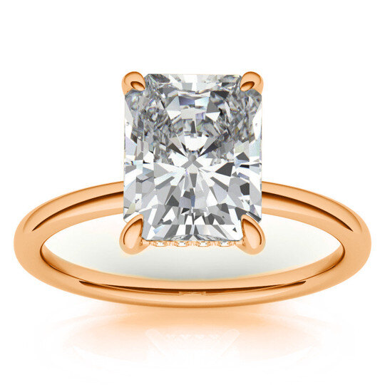 Anillo de compromiso solitario de moissanita talla esmeralda en oro rosa de 10 quilates