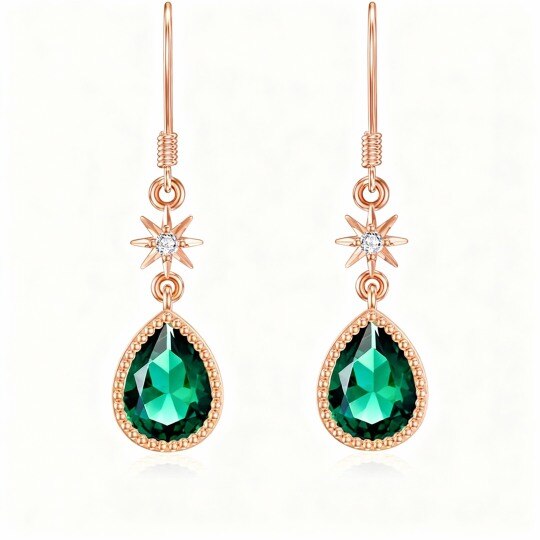 Pendientes colgantes de estrella de esmeralda en oro rosa de 10 quilates