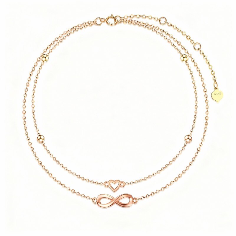 Bracelet de cheville à breloques multicouches en or rose 14 carats avec cœur et symbole de l'infini-1