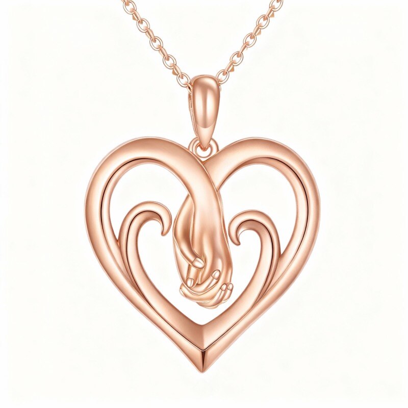 Collier pendentif cœur en or rose 18 carats avec pendentif mains jointes-1