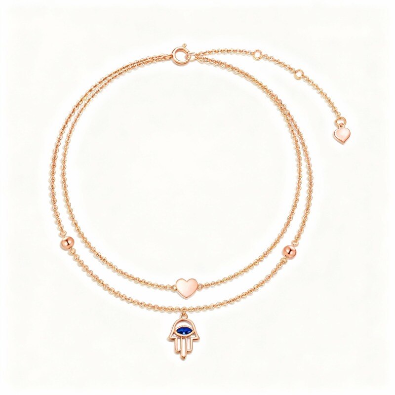 18-karätiges Roségold-Fußkettchen mit mehrlagigem Anhänger in Form einer Hamsa-Hand und eines Herzes aus Zirkonia im Marquise-Schliff-1